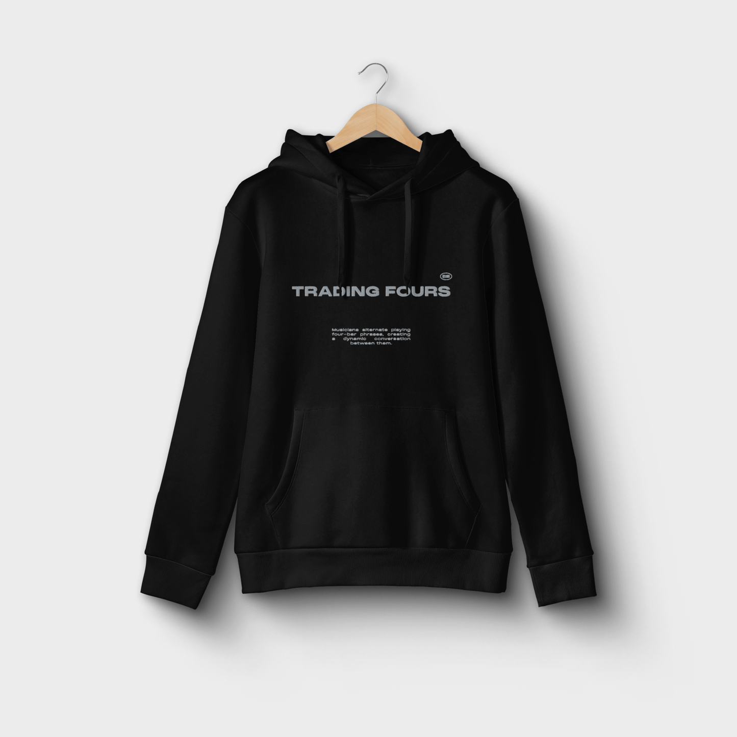 Rhythmic Minimalism Hoodie – Unisex Hoodie Featuring Embroidered “Trading Fours” Phrase | Soft Cotton Blend