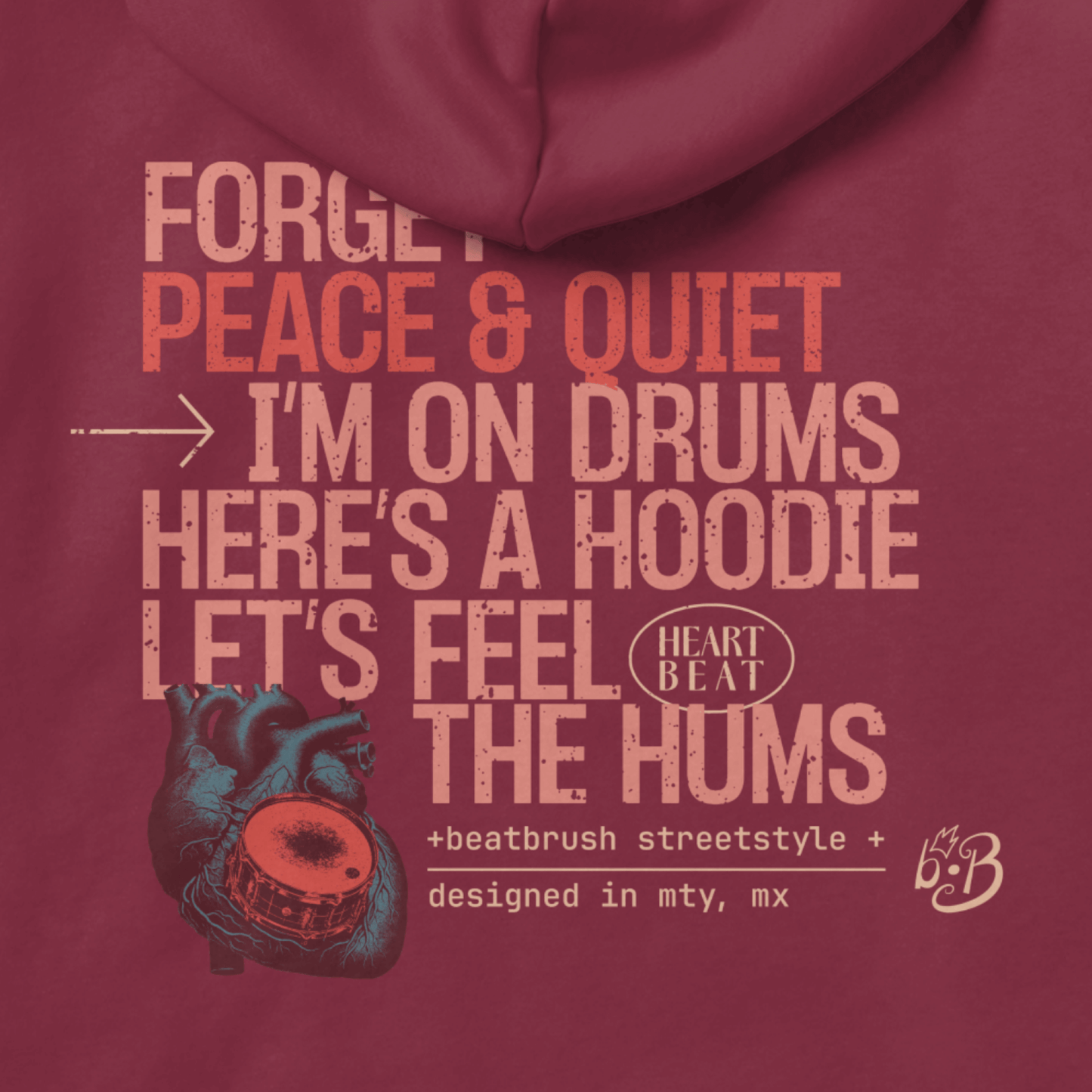 Close-up of the drum print design on the Unsilent Society Drummer Hoodie in maroon - Beat Inspired Apparel.