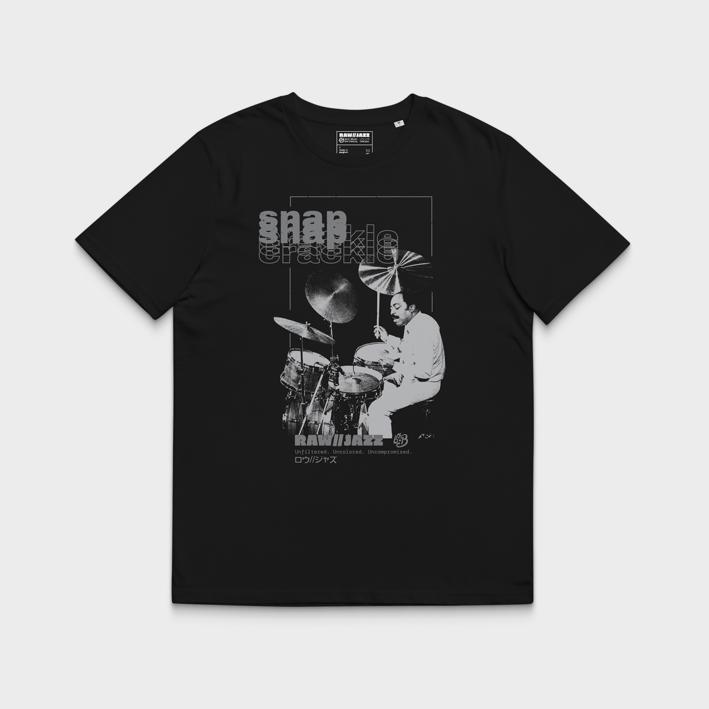 Black t-shirt with a graphic of a Roy Haynes playing drums and text on a white background